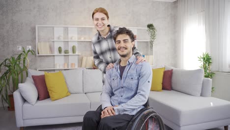 Disabled-man-and-his-girlfriend-are-happy-at-home.-Sincere-Friendship.